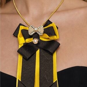 Elegant Black and Yellow Bow Necklace